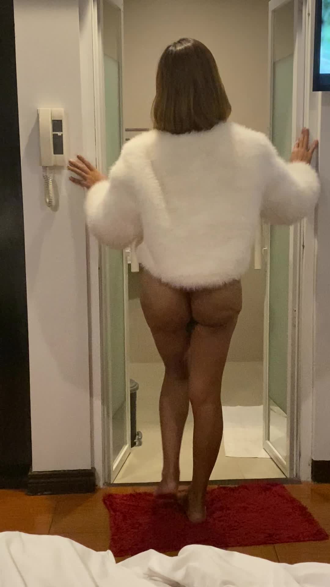 Getting ready wearing a white fur